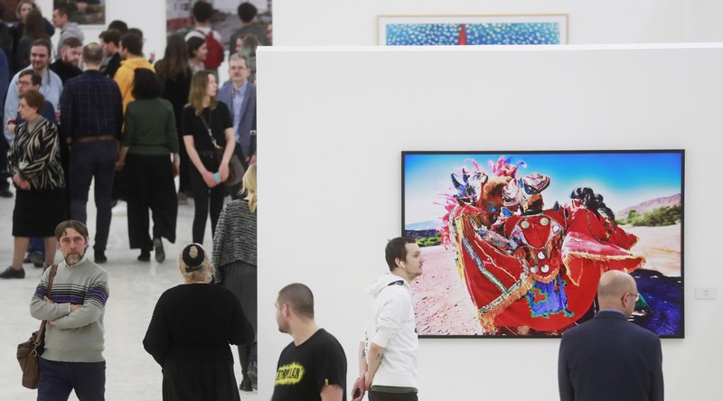 MOSCOW, RUSSIA - FEBRUARY 12, 2019: Visitors view an exhibition of photographs by Gaby Herbstein, at the 11th Moscow International Biennale, Fashion and Style in Photography, at Moscow's Manezh Central Exhibition Hall. Sergei Fadeichev/TASS

Ðîññèÿ. Ìîñêâà. Íà âûñòàâêå ðàáîò àðãåíòèíñêîé õóäîæíèöû Ãàáè Õåðáøòåéí î íàðîäíîì ïðàçäíèêå La Diablada, îòêðûòîé â ðàìêàõ XI Ìîñêîâñêîé ìåæäóíàðîäíîé áèåííàëå "Ìîäà è ñòèëü â ôîòîãðàôèè-2019" â ÖÂÇ "Ìàíåæ". Ñåðãåé Ôàäåè÷åâ/ÒÀÑÑ
