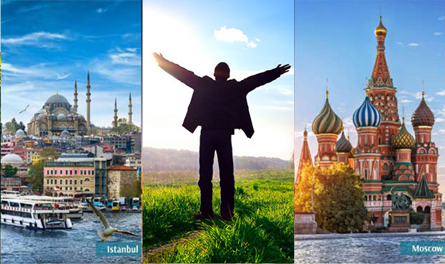 Russian Prime Minister Vladimir Putin (C) casts his vote on an electronic ballot box in a polling station in Moscow March 4, 2012.  Putin sought a convincing victory in Russia's presidential election on Sunday to strengthen his hand in dealing with the biggest opposition protests since he rose to power 12 years ago. REUTERS/Alexei Nikolsky/RIA Novosti/Pool (RUSSIA - Tags: POLITICS ELECTIONS) THIS IMAGE HAS BEEN SUPPLIED BY A THIRD PARTY. IT IS DISTRIBUTED, EXACTLY AS RECEIVED BY REUTERS, AS A SERVICE TO CLIENTS. FOR EDITORIAL USE ONLY. NOT FOR SALE FOR MARKETING OR ADVERTISING CAMPAIGNS