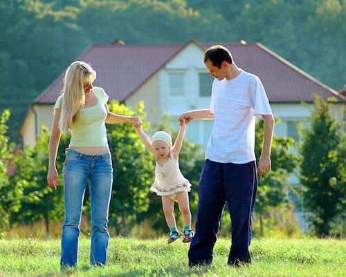 Happy family on meadow