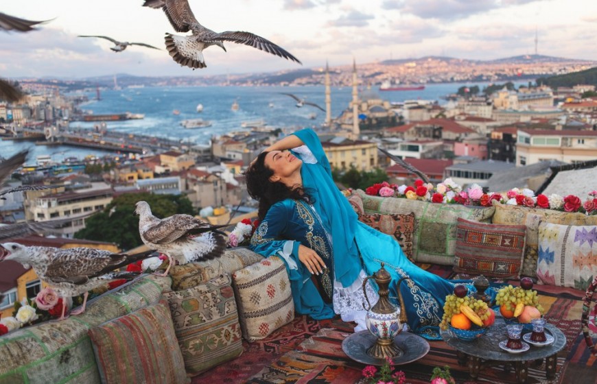 Beautiful,Girl,Sitting,On,A,Roof,Of,Istanbul,With,Great